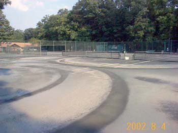 damaged tennis court